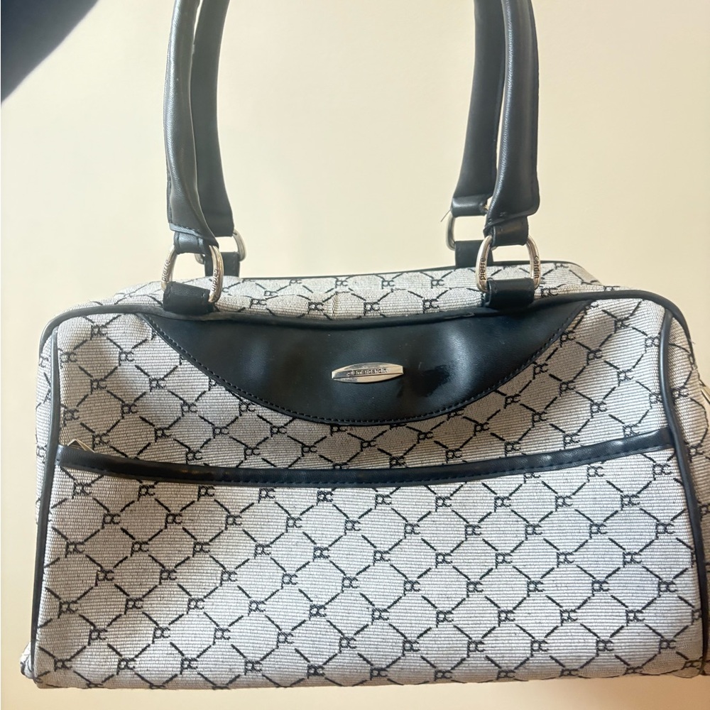 Authentic Pierre Cardin bowler style bag.